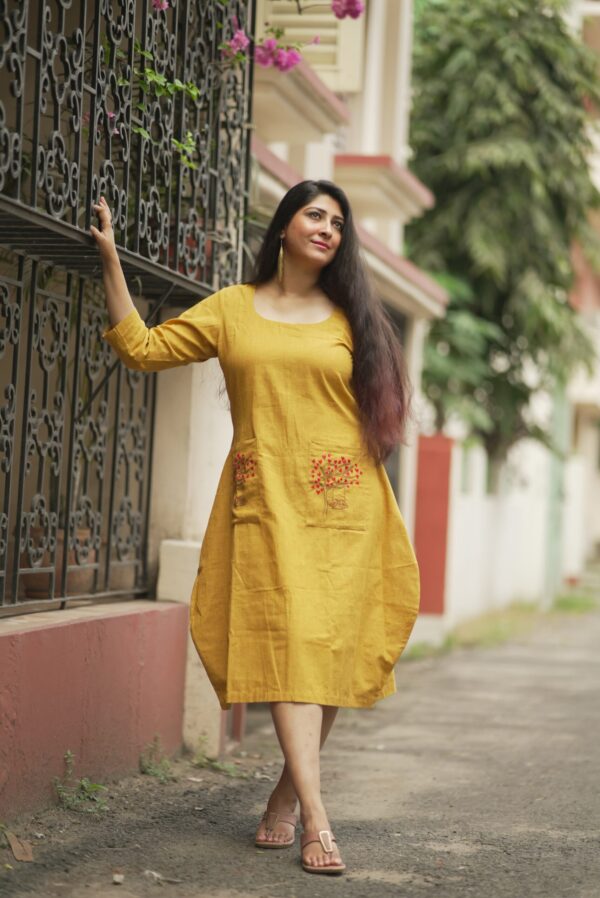 Rounded Scoop Neck Tulip Cut Dress with Hand Embroidered Pocket